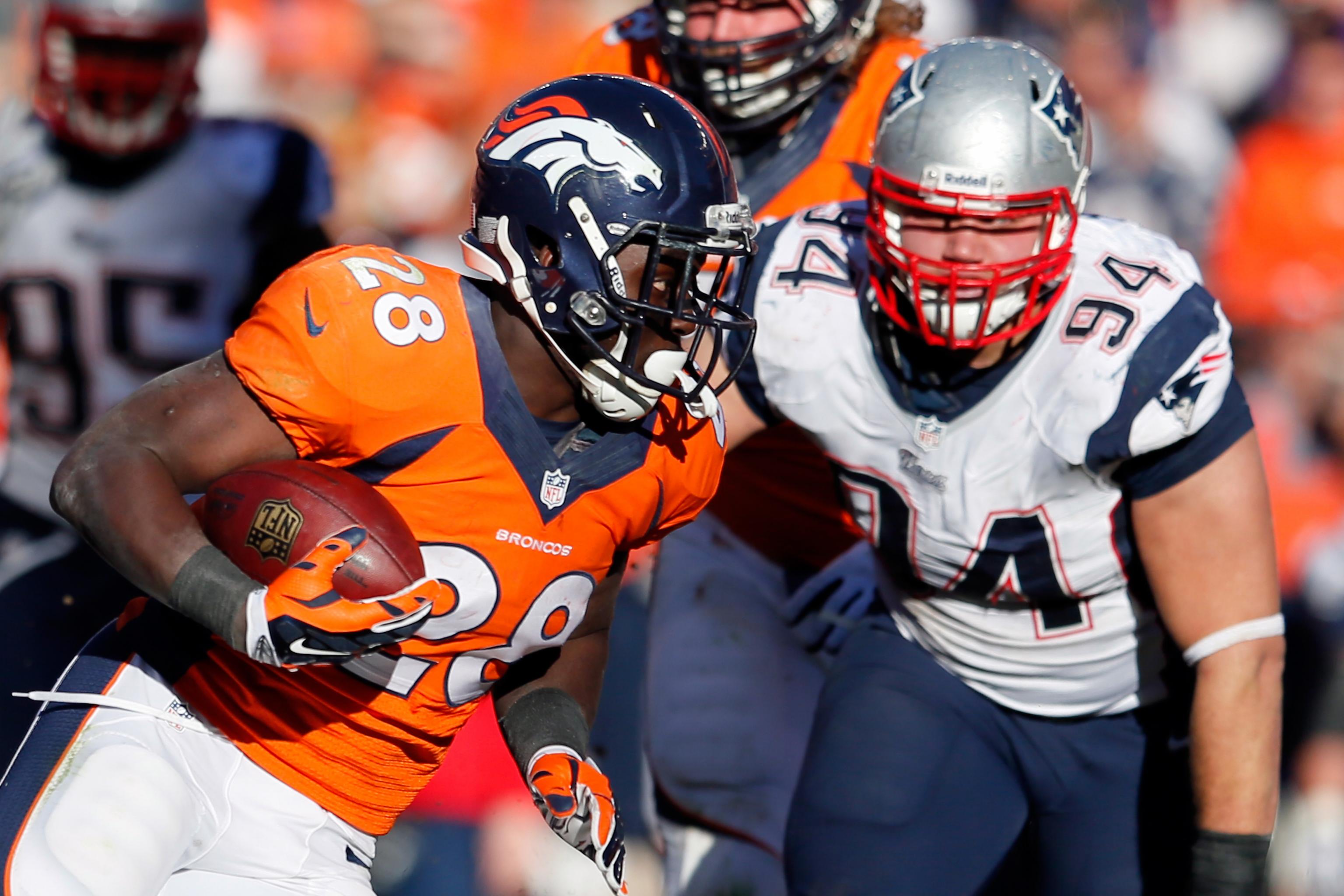 Running back Montee Ball #28 of the Denver Broncos runs with the