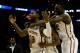 SAN ANTONIO, TX - MARCH 23: DeAndre Kane #50, Monte Morris #11 and Daniel Edozie #42 of the Iowa State Cyclones celebrate after defeating the North Carolina Tar Heels 85-83 in the third round of the 2014 NCAA Men's Basketball Tournament at the AT&T Center on March 23, 2014 in San Antonio, Texas. (Photo by Tom Pennington/Getty Images)