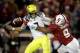 PALO ALTO, CA - NOVEMBER 07: Marcus Mariota #8 of the Oregon Ducks fumbles the ball when pressured by James Vaughters #9 of the Stanford Cardinal in the fourth period at Stanford Stadium on November 7, 2013 in Palo Alto, California. (Photo by Ezra Shaw/Getty Images)