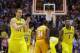 Michigan's Nik Stauskas reacts after the second half of an NCAA Midwest Regional semifinal college basketball tournament game against the Tennessee Friday, March 28, 2014, in Indianapolis. Michigan won 73-71. (AP Photo/Michael Conroy)