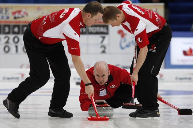 Canada's skip Kevin Koe, center, releases a stone as first Nolan Thiessen, left, and second Carter Rycroft sweep during their gold medal match against Norway, at the Curling World Championships, in Cortina D'Ampezzo, Italy, Sunday, April 11, 2010. Canada won the match. (AP Photo/Antonio Calanni)