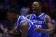 INDIANAPOLIS, IN - MARCH 28: Alex Poythress #22 and Julius Randle #30 of the Kentucky Wildcats celebrate defeating the Louisville Cardinals 74 to 69 during the regional semifinal of the 2014 NCAA Men's Basketball Tournament at Lucas Oil Stadium on March 28, 2014 in Indianapolis, Indiana. (Photo by Jonathan Daniel/Getty Images)