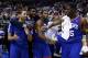 From left to right, Philadelphia 76ers' Michael Carter-Williams, Nerlens Noel, Hollis Thompson and Henry Sims celebrate in the final seconds of an NBA basketball game against the Detroit Pistons, Saturday, March 29, 2014, in Philadelphia. Philadelphia won 123-98, breaking a 26-game losing streak. (AP Photo/Matt Slocum)