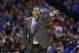 Kentucky head coach John Calipari reacts during the first half of an NCAA Midwest Regional semifinal college basketball tournament game against the Louisville Friday, March 28, 2014, in Indianapolis. (AP Photo/David J. Phillip)