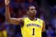 INDIANAPOLIS, IN - MARCH 28: Glenn Robinson III #1 of the Michigan Wolverines celebrates a three pointer in the first half against the Tennessee Volunteers during the regional semifinal of the 2014 NCAA Men's Basketball Tournament at Lucas Oil Stadium on March 28, 2014 in Indianapolis, Indiana. (Photo by Andy Lyons/Getty Images)