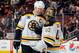 PHILADELPHIA, PA - JANUARY 25: Zdeno Chara #33 and Tuukka Rask #40 of the Boston Bruins celebrate after defeating the Philadelphia Flyers at the Wells Fargo Center on January 25, 2014 in Philadelphia, Pennsylvania. The Bruins defeated the Flyers 6-1. (Photo by Jim McIsaac/NHLI via Getty Images)