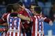 Atletico's Diego Costa celebrates his goal with team mates during a Spanish La Liga soccer match between Atletico Madrid and Granada at the Vicente Calderon stadium in Madrid, Spain, Wednesday, March 26, 2014. (AP Photo/Andres Kudacki)