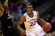 KANSAS CITY, MO - MARCH 13: Andrew Wiggins #22 of the Kansas Jayhawks drives upcourt as Marcus Smart #33 of the Oklahoma State Cowboys defends during the Big 12 Basketball Tournament quarterfinal game at Sprint Center on March 13, 2014 in Kansas City, Missouri. (Photo by Jamie Squire/Getty Images)