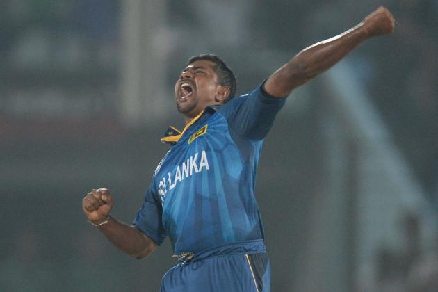 Sri Lanka's Rangana Herath celebrates the wicket of New Zealand's captain Brendon McCullum during their ICC Twenty20 Cricket World Cup match in Chittagong, Bangladesh, Monday, March 31, 2014. (AP Photo/A.M. Ahad)