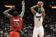 Jan 5, 2014; Miami, FL, USA; Miami Heat small forward LeBron James (6) shoots over Toronto Raptors power forward Amir Johnson (15) during the second half at American Airlines Arena. Miami won 102-97. Mandatory Credit: Steve Mitchell-USA TODAY Sports