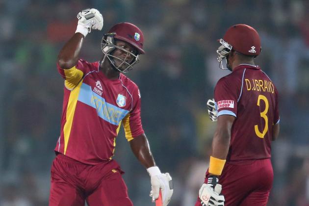 DHAKA, BANGLADESH - APRIL 01:  Dwayne Bravo and Darren Sammy of the West Indies gesture after hitting a boundary during the ICC World Twenty20 Bangladesh 2014 match between West Indies and Pakistan at Sher-e-Bangla Mirpur Stadium on April 1, 2014 in Dhaka, Bangladesh.  (Photo by Scott Barbour/Getty Images)