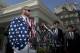 Boston Red Sox outfielder Jonny Gomes, left, speaks to reporters in front of the West Wing of the White House in Washington, Tuesday, April 1, 2014, following a ceremony where President Barack Obama honored the 2013 World Series baseball champion the Boston Red Sox on the White House South Lawn. (AP Photo/Manuel Balce Ceneta)
