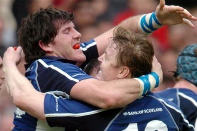 Brian O'driscoll of Leinster, right, and teammate Shane Horgan react after Leinster won their quarterfinal match of the European Rugby Cup against Toulouse, Saturday, April 1, 2006 in Toulouse, southwestern France. Leinster defeated Toulouse 41-33. (AP Photo/Remy Gabalda)