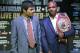 Boxer Manny Pacquiao, of the Phillipines, left, glances at his opponent Timothy Bradley of Indio, Ca., while posing for a photo with the current WBO World Welterweight champion during a press conference,Thursday, Feb. 6, 2014, in New York. The pair will face off in a title fight April 12, 2014, in Las Vegas. (AP Photo/Kathy Willens)