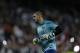 FC Barcelona's goalkeeper Victor Valdes warms up before a Spanish La Liga soccer match against Real Madrid at the Santiago Bernabeu stadium in Madrid, Sunday March 23, 2014. (AP Photo/Paul White)