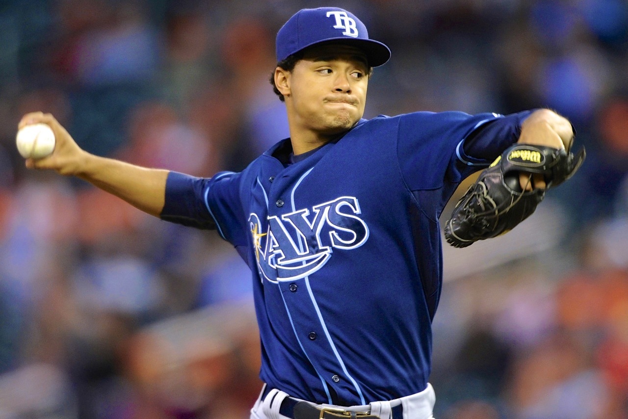 An American professional baseball player, Chris Archer holds a net