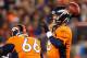 EAST RUTHERFORD, NJ - FEBRUARY 02: Quarterback Peyton Manning #18 of the Denver Broncos throws during Super Bowl XLVIII at MetLife Stadium on February 2, 2014 in East Rutherford, New Jersey. (Photo by Elsa/Getty Images)