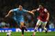 LONDON, ENGLAND - MARCH 29: Samir Nasri of Manchester City and Santi Cazorla of Arsenal battle for the ball during the Barclays Premier League match between Arsenal and Manchester City at Emirates Stadium on March 29, 2014 in London, England. (Photo by Shaun Botterill/Getty Images)
