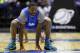 Kentucky's Julius Randle stretches during practice for their NCAA Midwest Regional semifinal college basketball tournament game Thursday, March 27, 2014, in Indianapolis. Kentucky plays Louisville on Friday, March 28, 2013. (AP Photo/Michael Conroy)