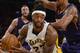 Los Angeles Lakers forward Jordan Hill (27) battles Phoenix Suns forward Channing Frye, back right, in the first half of an NBA basketball game, Sunday, March 30, 2014, in Los Angeles.(AP Photo/Gus Ruelas)