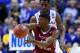 ST LOUIS, MO - MARCH 21: Andrew Wiggins #22 of the Kansas Jayhawks defends Marcus Lewis #12 of the Eastern Kentucky Colonels during the second round of the 2014 NCAA Men's Basketball Tournament at Scottrade Center on March 21, 2014 in St Louis, Missouri. (Photo by Andy Lyons/Getty Images)