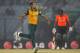 South Africa's Imran Tahir, left, celebrates taking the wicket of England's Jos Buttler during their ICC Twenty20 Cricket World Cup match in Chittagong, Bangladesh, Saturday, March 29, 2014. (AP Photo/A.M. Ahad)