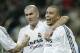 Real Madrids Brazilian striker Ronaldo, right, celebrates with Zinezine Zidane of France, center and Michel Salgado after Ronaldo scored against Real Sociadad during a Spanish league soccer match in Madrid Sunday, Dec. 12, 2004. (AP Photo/Paul White)