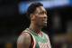 Milwaukee Bucks center Larry Sanders looks on against the Denver Nuggets in the first quarter of an NBA basketball game in Denver on Wednesday, Feb. 5, 2014. (AP Photo/David Zalubowski)
