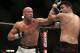 Karo Parisyan, right, covers up against Josh Burkman at UFC 71, Saturday, May 26, 2007 at The MGM Grand Arena in Las Vegas. Parisyan won via unanimous decision. (AP Photo/Eric Jamsion)