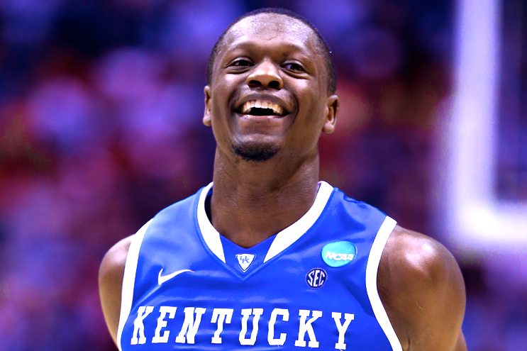 Kentucky forward Julius Randle (30) celebrates against Wichita State during  the second half of a third-round game of the NCAA college basketball  tournament Sunday, March 23, 2014, in St. Louis. (AP Photo/Jeff