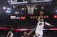 Golden State Warriors forward Marreese Speights (5) goes up for a dunk next to Sacramento Kings forward Rudy Gay, center, during the second half of an NBA basketball game Friday, April 4, 2014, in Oakland, Calif. Golden State won 102-69. (AP Photo/Marcio Jose Sanchez)