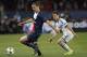 PSG's Zlatan Ibrahimovic, left, is challenged by Chelsea's Eden Hazard during the Champions League quarterfinal first leg soccer match between PSG and Chelsea, at the Parc des Princes stadium, in Paris, Wednesday, April 2, 2014. (AP Photo/Christophe Ena)