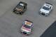 BRISTOL, TN - MARCH 16: Dale Earnhardt Jr., driver of the #88 National Guard Chevrolet, leads Greg Biffle, driver of the #16 Meguiar's Ford, and Reed Sorenson, driver of the #36 Chevrolet, during the NASCAR Sprint Cup Series Food City 500 at Bristol Motor Speedway on March 16, 2014 in Bristol, Tennessee. (Photo by Drew Hallowell/Getty Images)
