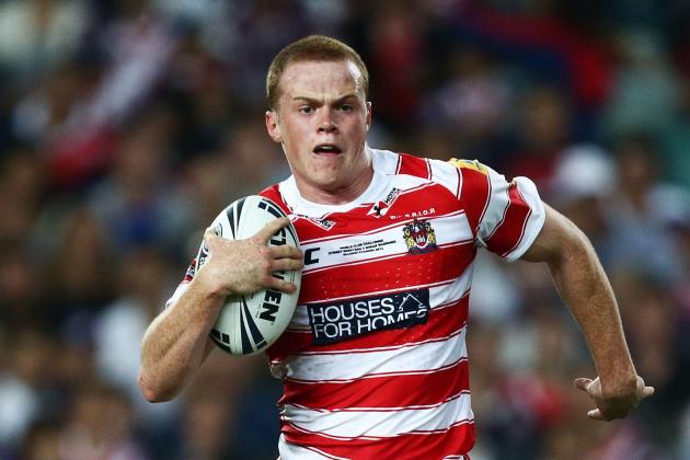SYDNEY, AUSTRALIA - FEBRUARY 22:  Joe Burgess of the Warriors runs with the ball during the NRL World Club Challenge match between the Sydney Roosters and the Wigan Warriors at Allianz Stadium on February 22, 2014 in Sydney, Australia.  (Photo by Matt King/Getty Images)
