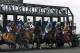 Thoroughbreds break from the starting game in the first horse race of opening day at Keeneland in Lexington, Ky., Friday, April 4, 2014. English Council (4), getting a late start, won the race. (AP Photo/Garry Jones)
