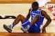 ARLINGTON, TX - APRIL 05: Julius Randle #30 of the Kentucky Wildcats falls to the ground during the NCAA Men's Final Four Semifinal against the Wisconsin Badgers at AT&T Stadium on April 5, 2014 in Arlington, Texas. (Photo by Ronald Martinez/Getty Images)