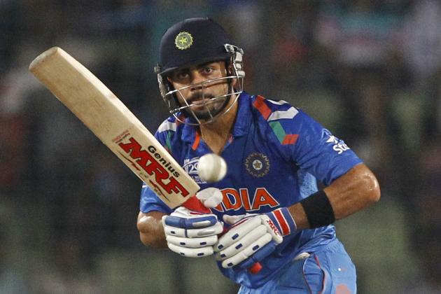 India's Virat Kohli plays a shot during their ICC Twenty20 Cricket World Cup semifinal match against South Africa in Dhaka, Bangladesh, Friday, April 4, 2014. (AP Photo/A.M. Ahad)