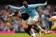 MANCHESTER, ENGLAND - APRIL 05: Yaya Toure of Manchester City is challenged by Jose Fonte of Southampton during the Barclays Premier League match between Manchester City and Southampton at Etihad Stadium on April 5, 2014 in Manchester, England. (Photo by Shaun Botterill/Getty Images)