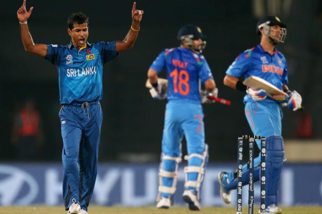 DHAKA, BANGLADESH - APRIL 06: Nuwan Kulasekara of Sri Lanka celebrates after dismissing Yuvraj Singh (R) of India during the Final of the ICC World Twenty20 Bangladesh 2014 between India and Sri Lanka at Sher-e-Bangla Mirpur Stadium on April 4, 2014 in Dhaka, Bangladesh. (Photo by Scott Barbour/Getty Images)