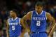 ATLANTA, GA - MARCH 16: Aaron Harrison #2 and Andrew Harrison #5 of the Kentucky Wildcats react in the first half against the Florida Gators during the Championship game of the 2014 Men's SEC Basketball Tournament at Georgia Dome on March 16, 2014 in Atlanta, Georgia. (Photo by Kevin C. Cox/Getty Images)