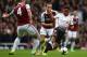 LONDON, ENGLAND - APRIL 06: Raheem Sterling of Liverpool is challenged by Kevin Nolan of West Ham during the Barclays Premier League match between West Ham United and Liverpool at Boleyn Ground on April 6, 2014 in London, England. (Photo by Mike Hewitt/Getty Images)