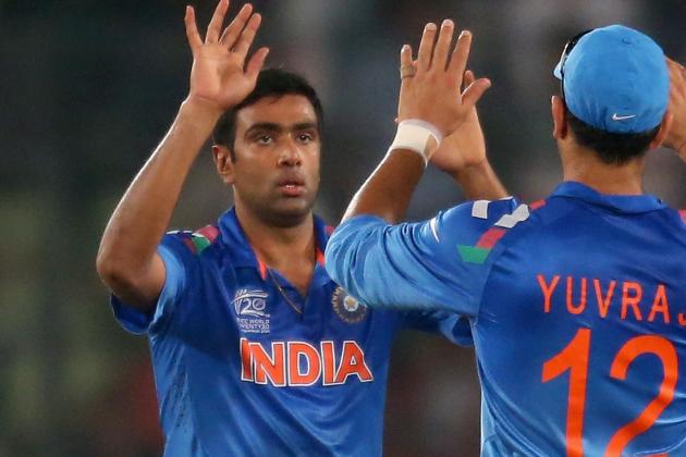 DHAKA, BANGLADESH - APRIL 04: Ravichandran Ashwin of India is congratulated by his teammates after dismissing AB de Villiers of South Africa during the ICC World Twenty20 Bangladesh 2014 2nd Semi-Final match between India and South Africa at Sher-e-Bangla Mirpur Stadium on April 4, 2014 in Dhaka, Bangladesh. (Photo by Scott Barbour/Getty Images)