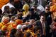 Tennessee coach Butch Jones makes his way through the crowd of fans during the Vol Walk before an NCAA college football game against Aurburn on Saturday, Nov. 9, 2013 in Knoxville, Tenn. (AP Photo/Wade Payne)