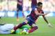 FC Barcelona's Alexis Sanchez, right, duels for the ball against Betis's Alvaro Vadillo during a Spanish La Liga soccer match at the Camp Nou stadium in Barcelona, Spain, Saturday, April 5, 2014. (AP Photo/Manu Fernandez)