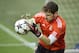 Real's keeper Iker Casillas exercises during the training session prior the UEFA Champions League second leg soccer match between Borussia Dortmund and Real Madrid in Dortmund, Monday, April 7, 2014. (AP Photo/Martin Meissner)