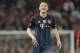 Bayern's Bastian Schweinsteiger smiles after he was sent off the field during the Champions League quarterfinal first leg soccer match between Manchester United and Bayern Munich at Old Trafford Stadium, Manchester, England, Tuesday, April 1, 2014.(AP Photo/Jon Super)