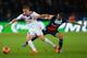 PARIS, FRANCE - JANUARY 31: Gregory Sertic of Girondins de Bordeaux is challenged by Lucas Rodrigues Da Silva of Paris Saint-Germain FC during the Ligue 1 match between Paris Saint-Germain FC and FC Girondins de Bordeaux at Parc des Princes on January 31, 2014 in Paris, France. (Photo by Shaun Botterill/Getty Images)