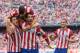 MADRID, SPAIN - APRIL 05: Raul Garcia (2ndR) of Atletico de Madrid celebrates scoring their opening goal with teammates Koke (L), Diego Godin (2ndL)David Villa (3dL) and Mario Suarez (R) during the La Liga match between Club Atletico de Madrid and Villarreal CF at Vicente Calderon Stadium on April 5, 2014 in Madrid, Spain. (Photo by Gonzalo Arroyo Moreno/Getty Images)