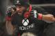 Demetrious Johnson celebrates after knocking out Joseph Benavidez in a UFC flyweight mixed martial arts title fight in Sacramento, Calif., Saturday, Dec. 14, 2013. (AP Photo/Steve Yeater)
