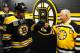 BOSTON, MA - MARCH 27: Jarome Iginla #12 of the Boston Bruins fist bumps alumni legend Johnny Bucyk before the game against the Chicago Blackhawks at the TD Garden on March 27, 2014 in Boston, Massachusetts. (Photo by Steve Babineau/NHLI via Getty Images)